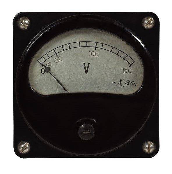 An old analog voltmeter with a needle and a scale
